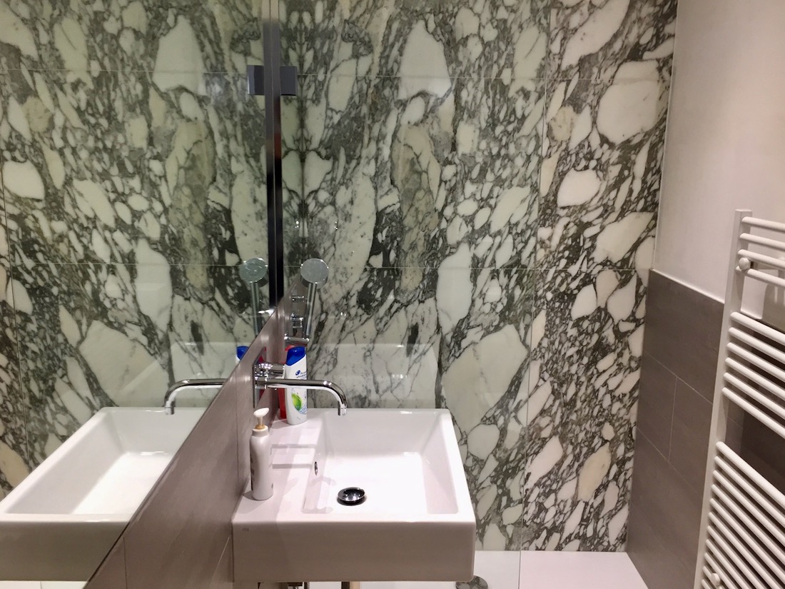 Room one en-suite with Arabescato marble.